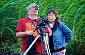 Director Danny Miller and Executive Producer Patsy Y. Iwasaki in a Maui canefield to film a fire. Photo by Baron Sekiya
